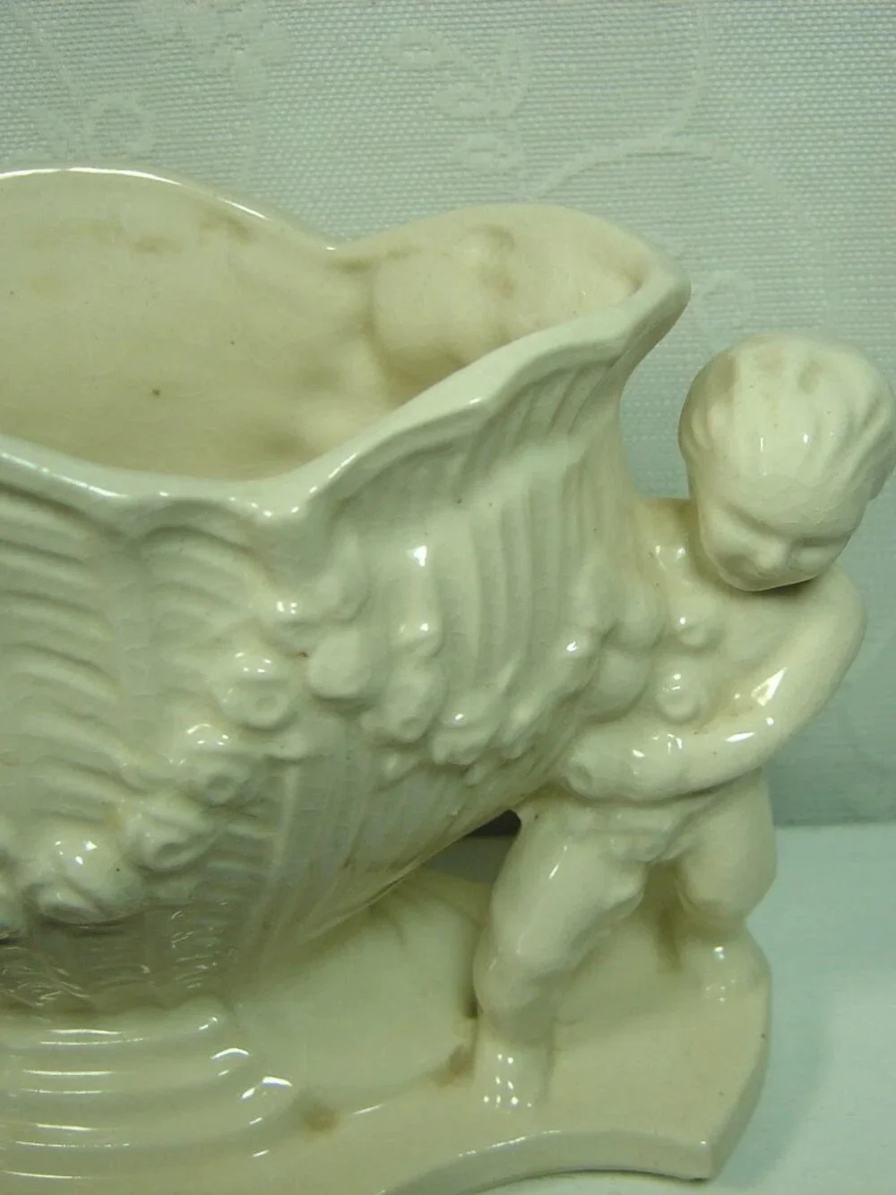 Vintage white planter/vase--cherubs beside a vase-5 1/4